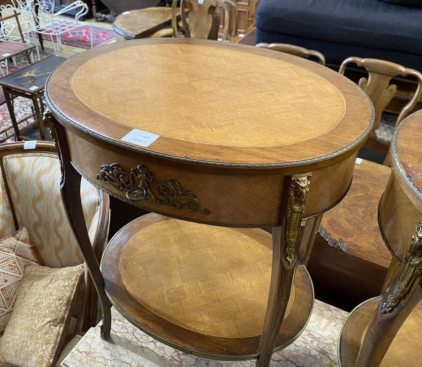 A pair of Louis XV style ormolu mounted banded walnut two tier side tables, width 54cm, depth 41cm, height 68cm